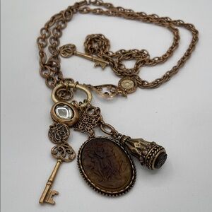 4.25.26-30 Chico’s 2n1 Bronze-Tone Cameo Pendant Necklace, Key & Charm Accents